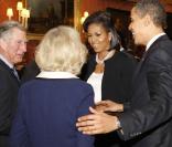 Cocktail party organisée à Buckingham par la reine Elizabeth : Barack et Michelle Obama avec le prince Charles et son épouse Camilla 