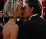 Laeticia et Johnny Hallyday, heureux et amoureux au Festival de Cannes, le 17 mai 2009, pour la projection de Vengeance de Johnnie To