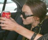 Lindsay Lohan sortant de l'hôtel de Samantha Ronson ce matin...