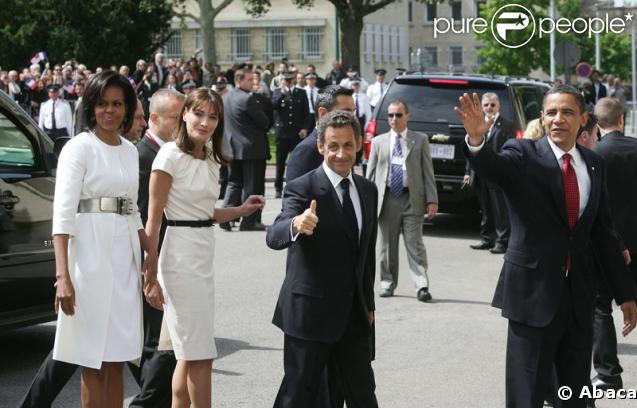Michelle Obama, Carla et Nicolas Sarkozy et Barack Obama lors de la commémoration du Débarquement en Normandie le 6 juin 2009