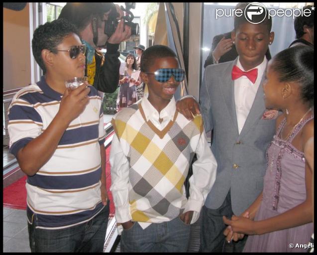 Les enfants de Kim Porter : Quincy et Christian à l'exposition de leur mère (Beverly Hills, 26 juin 2009) 