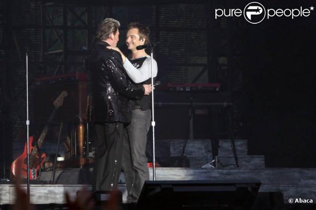 Johnny Hallyday en concert gratuit au pied de la Tour Eiffel le 14 juillet 2009, devant 700 000 à un million de spectateurs