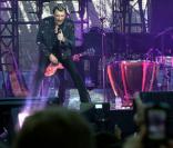 Johnny Hallyday en concert gratuit au pied de la Tour Eiffel le 14 juillet 2009, devant 700 000 à un million de spectateurs