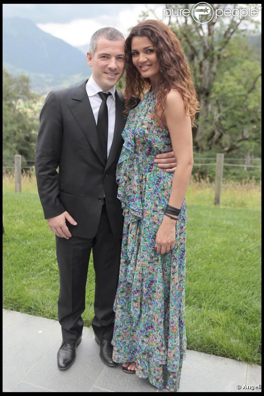 Bruno Putzulu et sa fiancée lors de la journée de baptême de Joy à Gstaad en Suisse le 5 juillet 2009