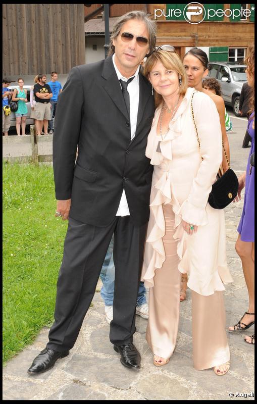 Stéphane Ferrara et sa future femme Dominique Cantien lors de la journée de baptême de Joy à Gstaad en Suisse le 5 juillet 2009