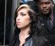 Amy Winehouse sort de son procès, le 24 juillet 2009, avec un look rock'n'roll !