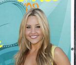 Amanda Bynes, rayonnante dans sa robe jaune  signée Hervé Leger 