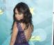 Vanessa Hudgens. Plus sexy que jamais, la jeune actrice d"High School Musical, nous dévoile son joli dos nu dans une magnifique robe Dior violette, avec les chaussures assorties. 
