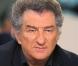 Eddy Mitchell. Le chanteur est aussi acteur dans le film La Totale.