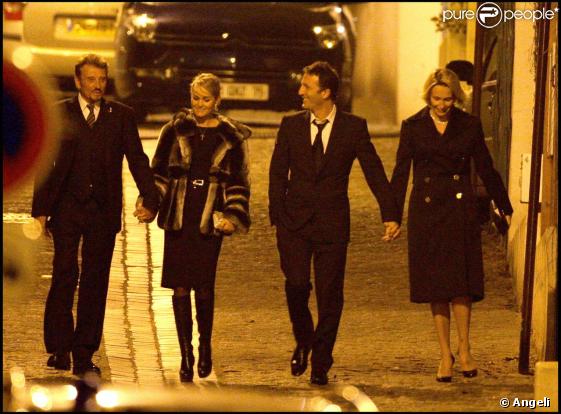 Johnny et Laeticia Hallyday accompagnés d'Arthur et Estelle Lefébure