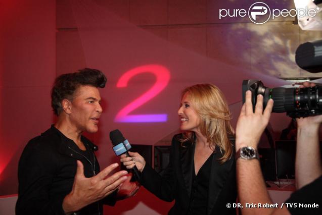 Grichka Bogdanoff et Estelle Martin lors de la soirée spéciale 25 ans de TV5 Monde le 17 septembre 2009 à Paris