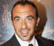 Nikos Aliagas : Il met Mustapha El Atrassi... en vente sur eBay !