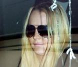 Lindsay Lohan n'a pas l'air très enjouée à la sortie de son déjeuner pour le 6126 fashion collection au E. Baldi à Beverly Hills le 15 décembre 2009  