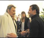 Laura Smet avec son père Johnny Hallyday et son compagnon Julien Delajoux au Stade de france.