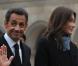Une allure sobre et chic pour Carla Bruni au côté de Nicolas Sarkozy le 11/01/10 à Paris pour les funérailles de Philippe Séguin. 
