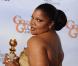Meilleur second rôle féminin : Mo'nique (Precious), qui arbore son prix au côté de Nicole Kidman, lors de la 67e cérémonie des Golden Globes à Los Angeles le 17 janvier 2010