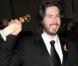 Le réalisateur Jason Reitman et son Golden Globe du meilleur scénario à l'occasion de l'after party des Golden Globe Awards, organisée par la Weinstein Company au Bar 210 de Los Angeles, le 17 janvier 2010.