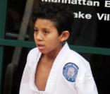Les enfants de Michael Jackson se rendant à une leçon de karaté à Encino (Californie) le 24 février 2010. Sur la photo : leur cousin Jermajesty 