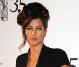 Mylène Jampanoï, toujours chic et élégante avait opté pour une robe noire d\'apparence stricte mais très sexy grâce à son large décolleté lors de la 35ème Cérémonie des César, le 27 février 2010