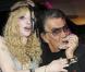Courtney Love au côté de son ami Roberto Cavalli lors de la soirée Roberto Cavalli à Milan à l'occasion de la Fashion Week le 28 février 2010