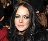 Lindsay Lohan assiste à la collection de prêt-à-porter automne-hiver 2010 de John Galliano à Paris en mars 2010 