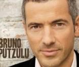 Bruno Putzulu dévoile son premier album,  Drôle de monde , le 14 mai 2010. Elsa Lunghini se joint à lui pour une reprise d'Yves Simon.