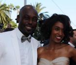 Jimmy Jean-Louis et une amie avant la projection du film Des Hommes et des Dieux, lors du Festival de Cannes, le 18 mai 2010