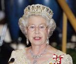 Le couple présidentiel reçu par la Reine