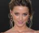 Amber Heard, à l'occasion de l'avant-première de Salt , qui s'est tenue au Graumann's Chinese Theatre d'Hollywood, à Los Angeles, le 19 juillet 2010.
