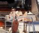 Michaël Youn et sa ravissante Isabelle se détendent sur un yacht à Saint-Tropez le 26 juillet 2010