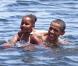 Barack et Michelle Obama avec leur fille Sasha : ils donnent l'exemple, même en vacances !