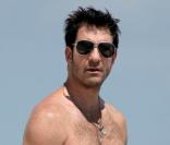 Dylan McDermott et sa nouvelle petite-amie à Miami, le 27 septembre 2010 