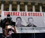 Manifestation pour la libération Stéphane Taponier et Hervé Guesquiere