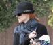 Marcia Cross partage un moment avec son époux Tom Mahoney et leurs deux filles, Eden et Savannah, dans un jardin public de Santa Monica, samedi 20 novembre.
