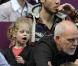 Brian Lynch et Jada, le mari et la fille de Kim Clijsters, le 13 février 2011 lors de la finale perdue par la Belge lors de l'open GDF Suez de France 