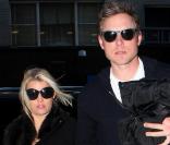 Jessica Simpson et Eric, son fiancé, en mars 2011. 