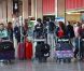 Les Anges se préparent à s'envoler vers Miami pour la deuxième saison des Anges de la télé-réalité à Orly le 18 avril 2011