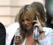 Pro jusqu'au bout, Kate Moss sait aussi se détendre sur le shooting de la campagne Mango avec Terry Richardson à Paris. Le 7 avril 2011 