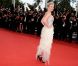 Kirsten Dunst lors de la montée des marches de clôture du festival de Cannes le 22 mai 2011