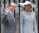 Au bras de son prince, Charlene Wittstock est radieuse pour assister au mariage de Kate de William en avril 2011 