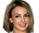 Britney Spears et sa coupe courte, emblématique de son allure du début des années 2000. 