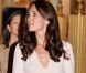 Kate Middleton découvre avec plaisir l'installation de sa fameuse robe de mariée, au palais de Buckingham, le 22 juillet 2011.