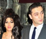 Amy Winehouse et Reg Traviss son amoureux en août 2010