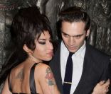 Amy Winehouse et Reg Traviss, à Londres, le 4 août 2010. 