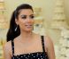 Kim Kardashian, en pleine sélection de son gâteau d'anniversaire, à Los Angeles, en juillet 2011.