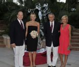 Charlene et Albert de Monaco avec Henri Rey, président du Golf, et son épouse à l'occasion du 100e anniversaire du Golf Club de Monte-Carlo, le 27 août 2011