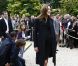 Le Président Nicolas Sarkozy et son épouse Carla Bruni-Sarkozy saluent  les visiteurs venus découvrir le palais de l'Elysée ouvert à l'occasion  des Journées européennes du patrimoine le 17 septembre 2011