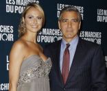George Clooney présente, à Paris, son film <em>Les Marches du pouvoir</em>. Il est accompagné de sa bien-aimée Stacy Keibler<em>. </em>Le 18 octobre 2011<em><br /></em>
