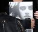 Rihanna sort de son hôtel, le livre de Ellen Von Unwerth - protograhe spécialisée dans les photos artistiques de charme - à la main, et se rend à Bercy afin de donner un concert le 20 octobre 2011
