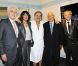 Pierre Perret entouré de son producteur Gilbert Coullier, Nicole Coullier, et de ses amis Lionel Jospin, Sylviane Agacinki, Alain Decaux et Bernard Pivot, dans sa loge de l'Olympia, le 28 octobre 2011.